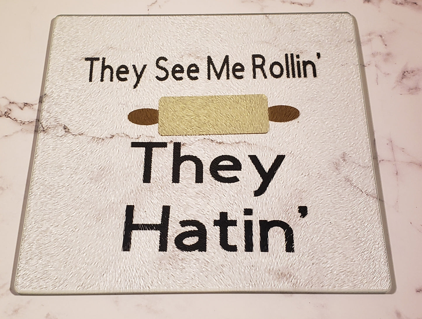 They See Me Rollin' Glass Cutting Board